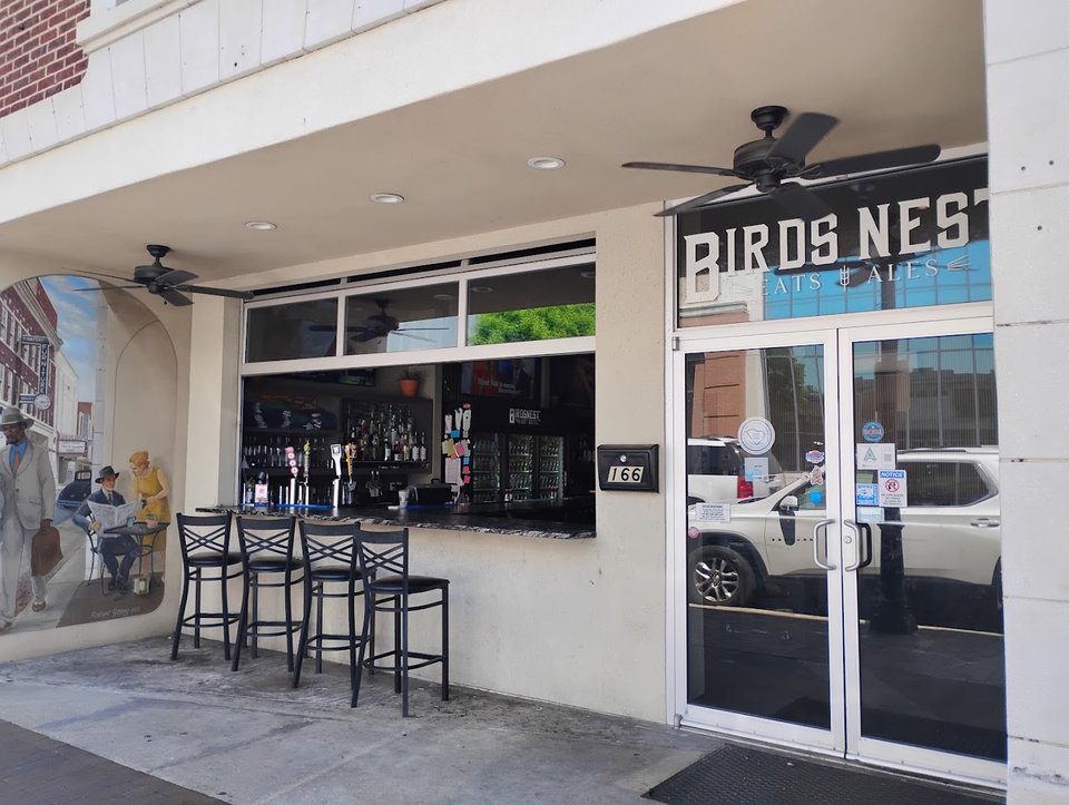 Accessible seating area inside a bar and grill.